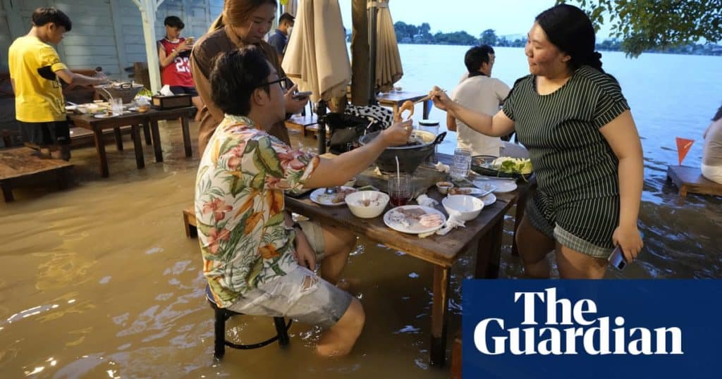 Thai restaurant rides wave of success as customers flock to dine in floodwaters | Thailand | The Guardian
